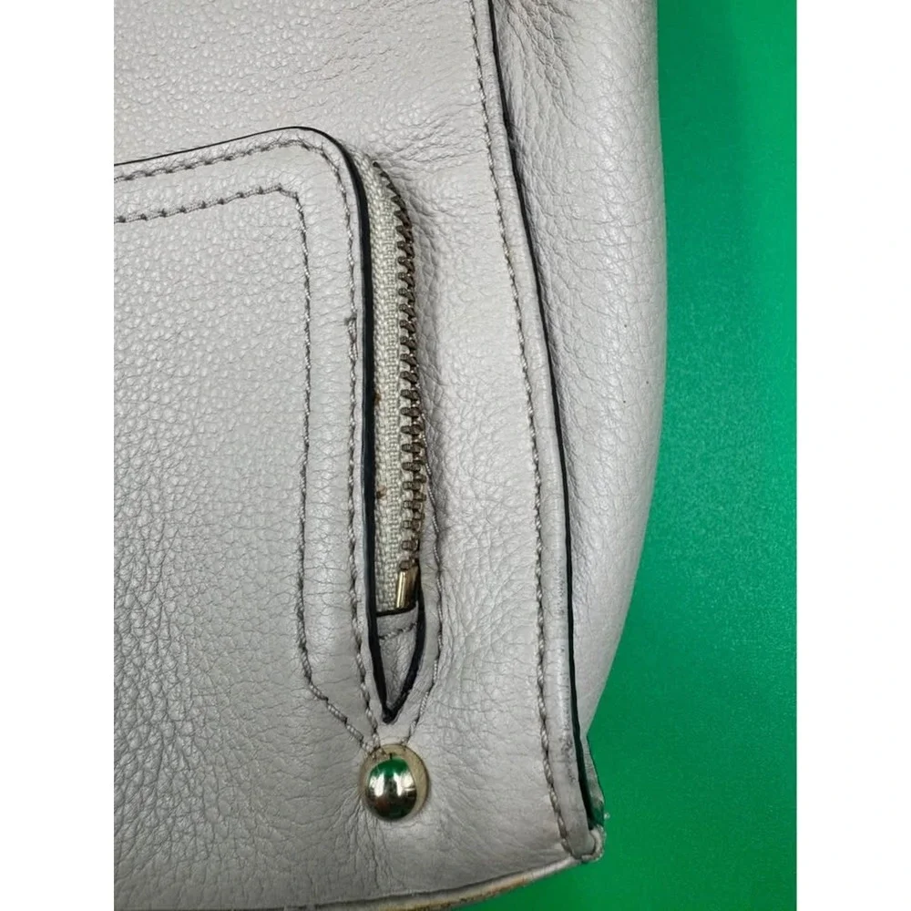 Kate Spade New York leather crossbody bag light gray pebbled purse w zip pockets